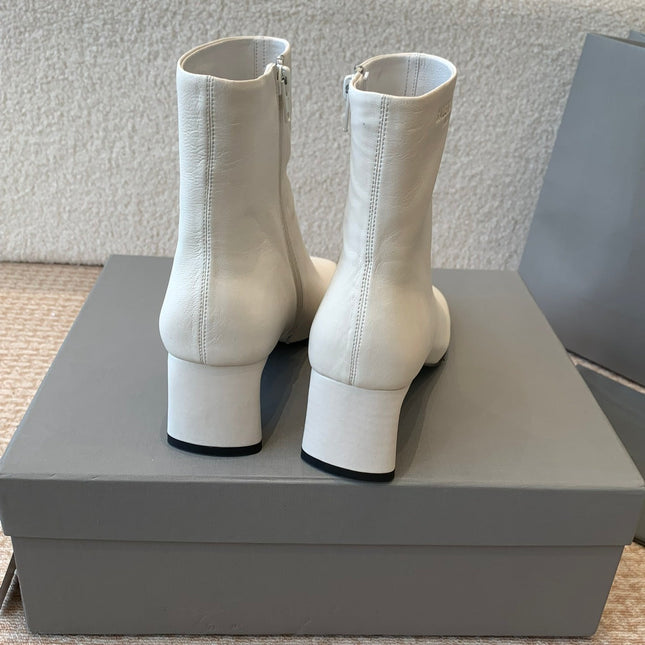 ANKLE BOOTS IN WHITE LOGO EMBOSSED SOFT SHEEPSKIN