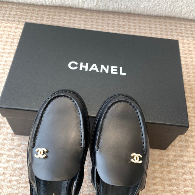 CC MOCCASIN SLINGBACK IN BLACK CALFSKIN