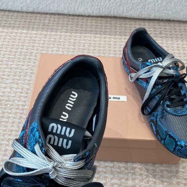 GYMNASIUM SNEAKER IN BLACK FABRIC AND BLUE SNAKE EFFECT CALFSKIN