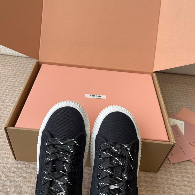 WASH SNEAKER MULES IN BLACK DENIM