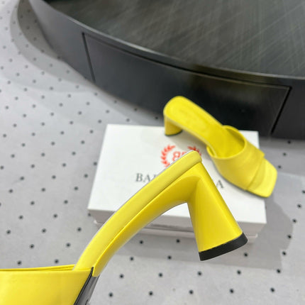 SQUARE-TOE MEDIUM HEEL MULES IN YELLOW CALFSKIN LOGO EMBOSSED