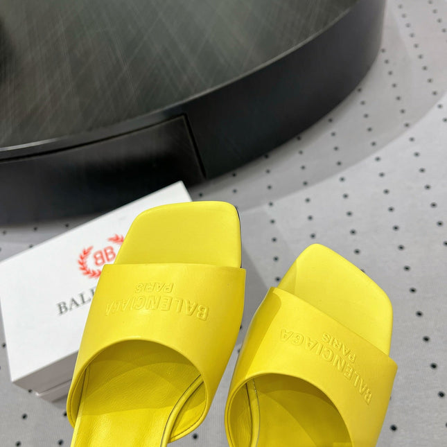 SQUARE-TOE MEDIUM HEEL MULES IN YELLOW CALFSKIN LOGO EMBOSSED