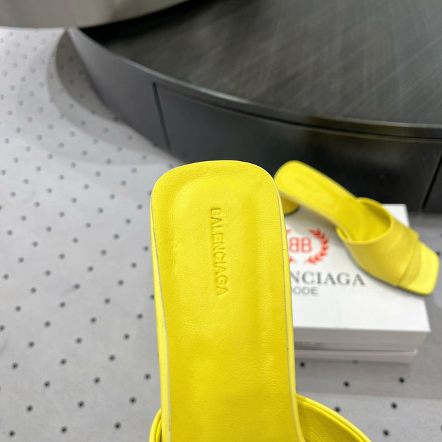 SQUARE-TOE MEDIUM HEEL MULES IN YELLOW CALFSKIN LOGO EMBOSSED
