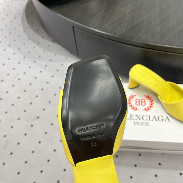 SQUARE-TOE MEDIUM HEEL MULES IN YELLOW CALFSKIN LOGO EMBOSSED