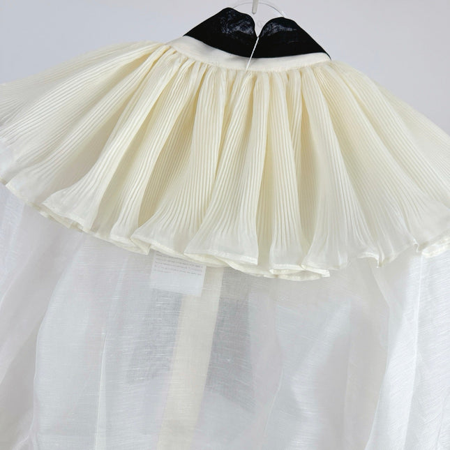 WHITE DRESSY TOP WITH BLACK TIE-NECK