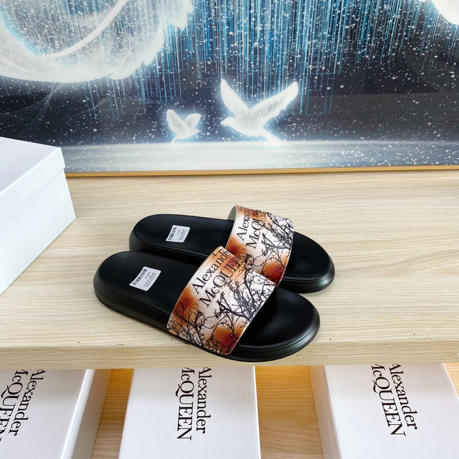 SLIDES SANDAL IN BLACK TPU ORANGE BAND BLACK BRANCH STRAP