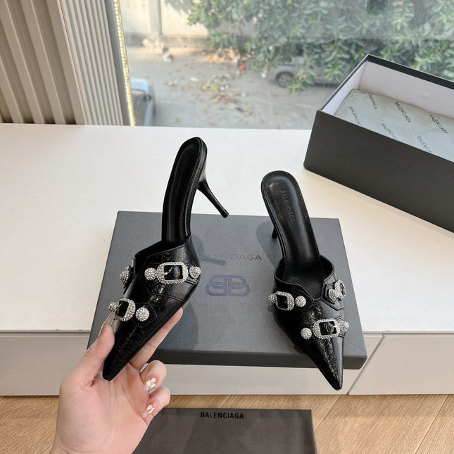 CRYSTAL BUCKLE BLACK WAX-OIL SHEEPSKIN HEELED MULES