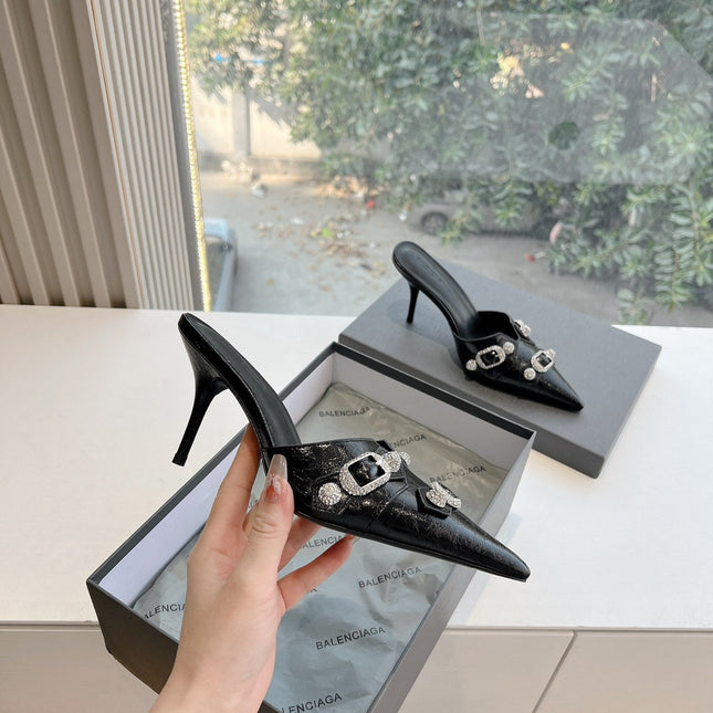 CRYSTAL BUCKLE BLACK WAX-OIL SHEEPSKIN HEELED MULES