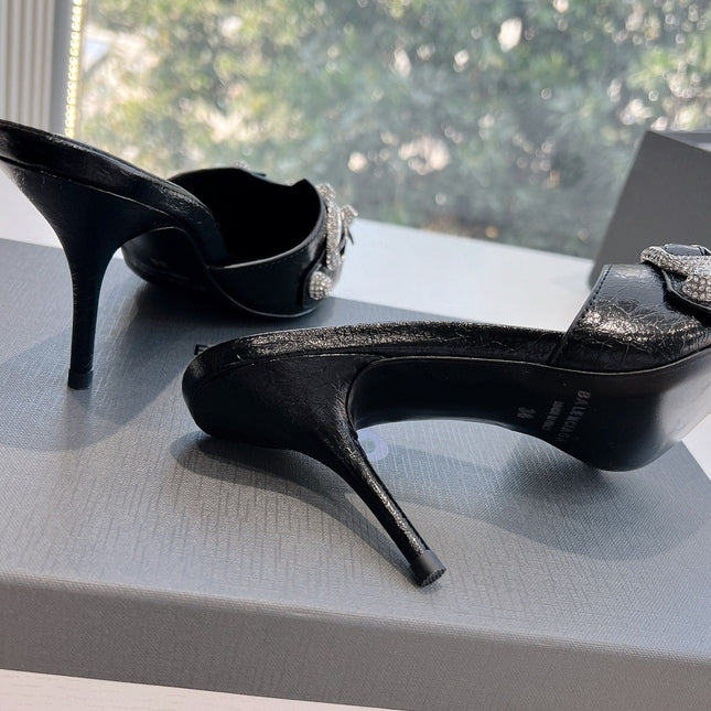 CRYSTAL BUCKLE BLACK WAX-OIL SHEEPSKIN HEELED MULES