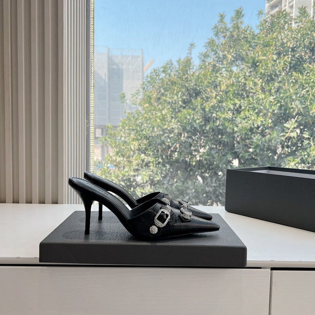 CRYSTAL BUCKLE BLACK WAX-OIL SHEEPSKIN HEELED MULES