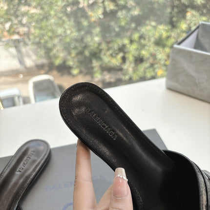 CAGOLE FLAT MULES IN BLACK CALFSKIN