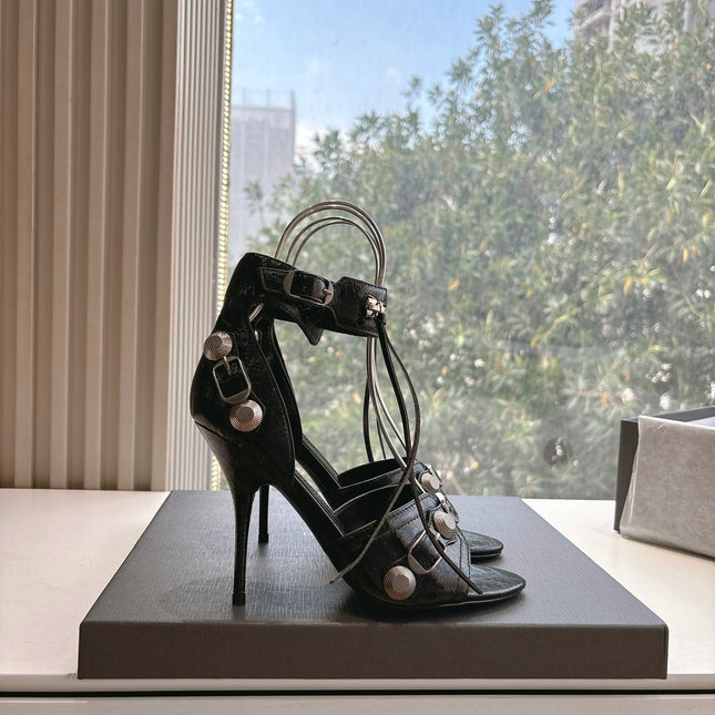 CAGOLE HIGH-HEEL SANDALS IN BLACK LAMBSKIN