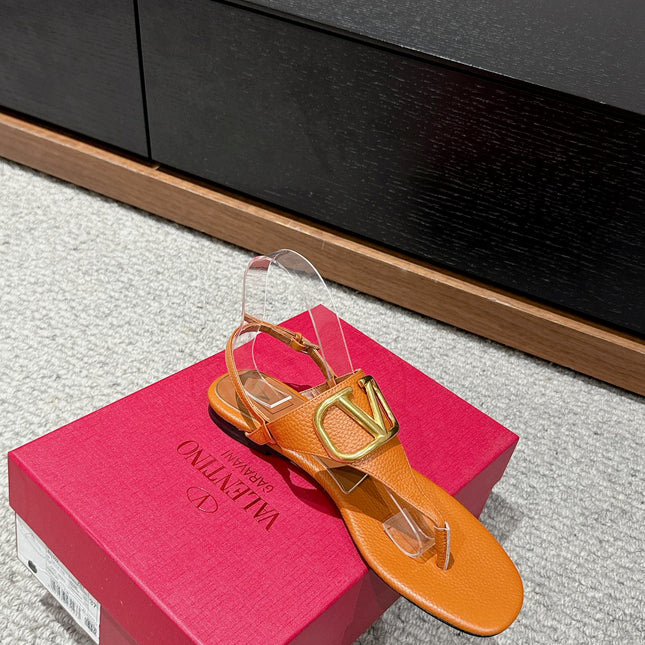 THONG SANDAL IN GINGER ORANGE CALFSKIN WITH GOLD LOGO