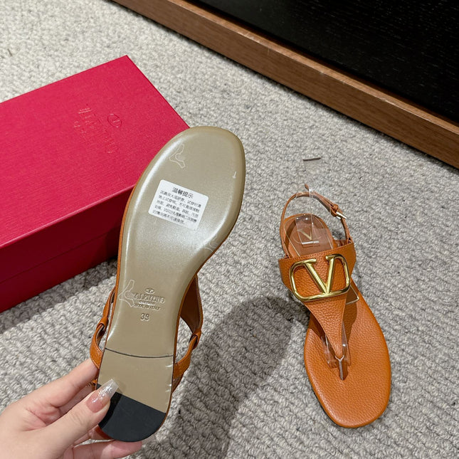 THONG SANDAL IN GINGER ORANGE CALFSKIN WITH GOLD LOGO