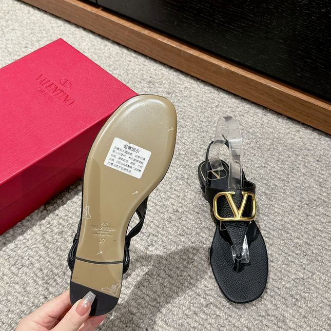 THONG SANDAL IN BLACK CALFSKIN WITH GOLD LOGO