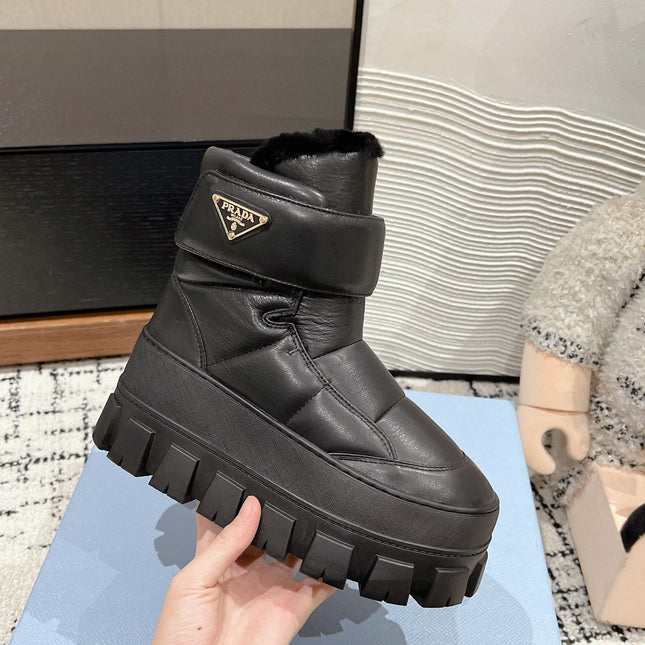 MONOLITH ANKLE BOOTS WITH STRAP IN BLACK CALFSKIN AND FLEECE LINING