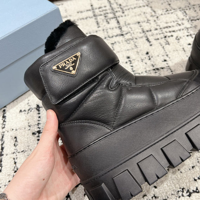 MONOLITH ANKLE BOOTS WITH STRAP IN BLACK CALFSKIN AND FLEECE LINING