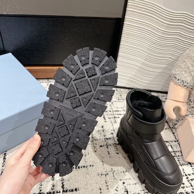 MONOLITH ANKLE BOOTS WITH STRAP IN BLACK CALFSKIN AND FLEECE LINING