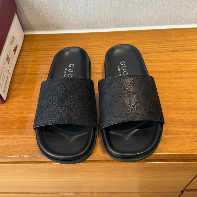 GG SLIDES IN BLACK SUEDE WITH EMBOSSED LOGO