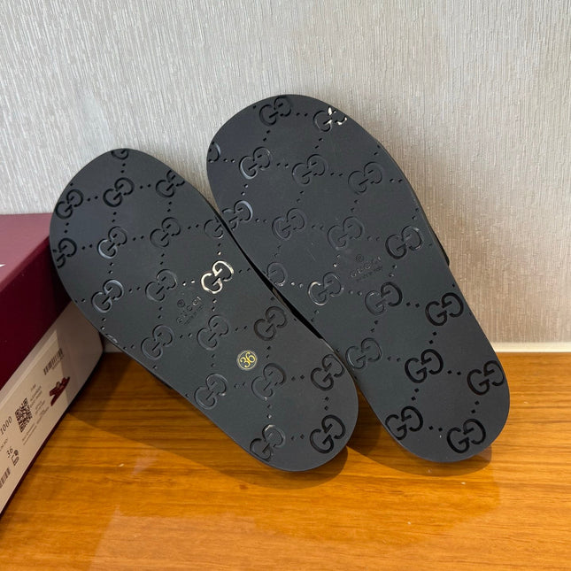 GG SLIDES IN BLACK SUEDE WITH EMBOSSED LOGO