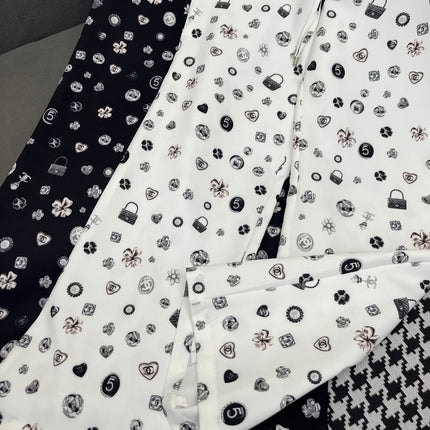 ALL-OVER LOGO PRINTED PANTS WITH STRETCH WAIST