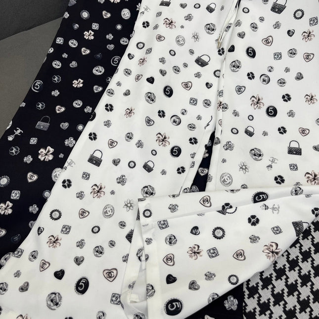 ALL-OVER LOGO PRINTED PANTS WITH STRETCH WAIST