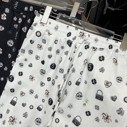 ALL-OVER LOGO PRINTED PANTS WITH STRETCH WAIST