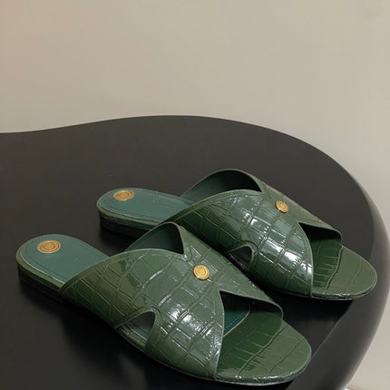 FLAT SLIPPERS IN MOSS GREEN CALFSKIN SNAKE EMBOSSING