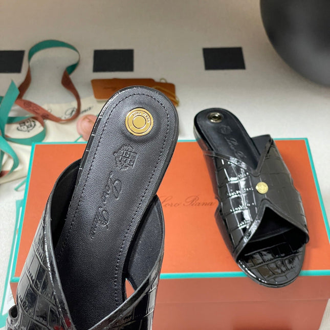 FLAT SLIPPERS IN BLACK CALFSKIN SNAKE EMBOSSING