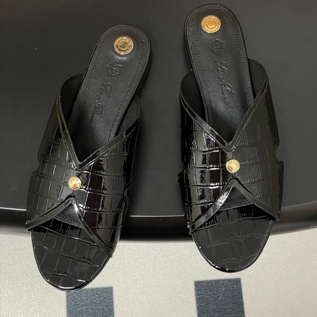 FLAT SLIPPERS IN BLACK CALFSKIN SNAKE EMBOSSING