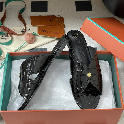 FLAT SLIPPERS IN BLACK CALFSKIN SNAKE EMBOSSING