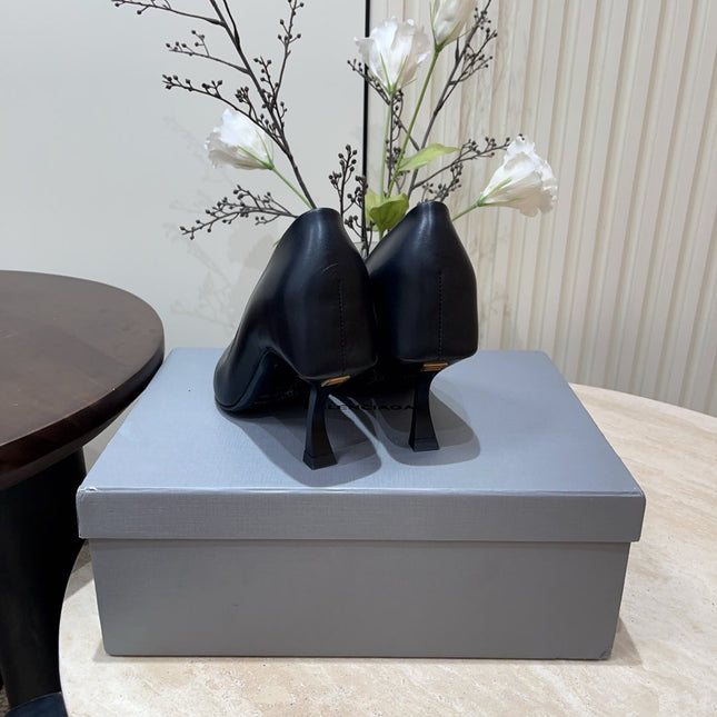 CURVED HEEL SHALLOW MOUTH PUMPS IN BLACK CALFSKIN