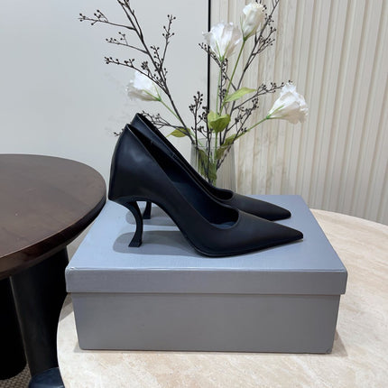 CURVED HEEL SHALLOW MOUTH PUMPS IN BLACK CALFSKIN