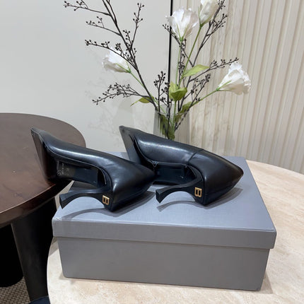 CURVED HEEL SHALLOW MOUTH PUMPS IN BLACK CALFSKIN