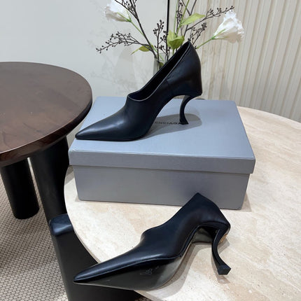 CURVED HEEL DEEP MOUTH PUMPS IN BLACK CALFSKIN