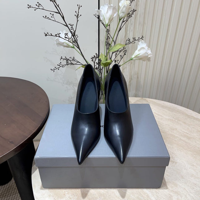 CURVED HEEL DEEP MOUTH PUMPS IN BLACK CALFSKIN
