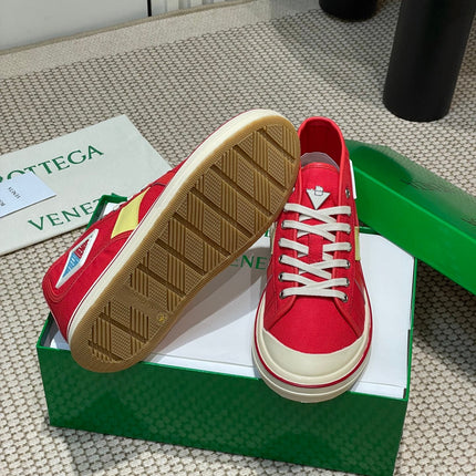 ELIOT SNEAKER IN CHERRY RED CANVAS AND CALFSKIN