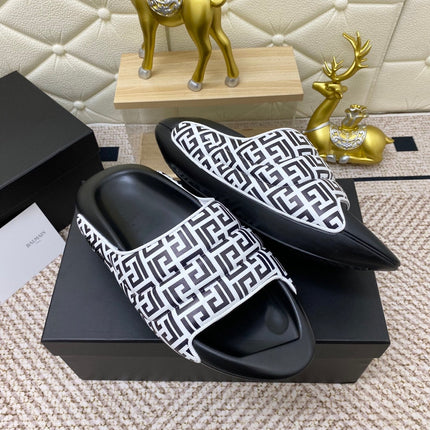 BALMAIN 25S BALMAIN MULES IN BLACK AND WHITE CALFSKIN