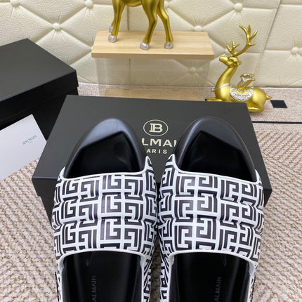 BALMAIN 25S BALMAIN MULES IN BLACK AND WHITE CALFSKIN