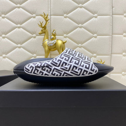 BALMAIN 25S BALMAIN MULES IN BLACK AND WHITE CALFSKIN