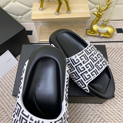 BALMAIN 25S BALMAIN MULES IN BLACK AND WHITE CALFSKIN