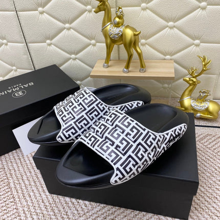 BALMAIN 25S BALMAIN MULES IN BLACK AND WHITE CALFSKIN
