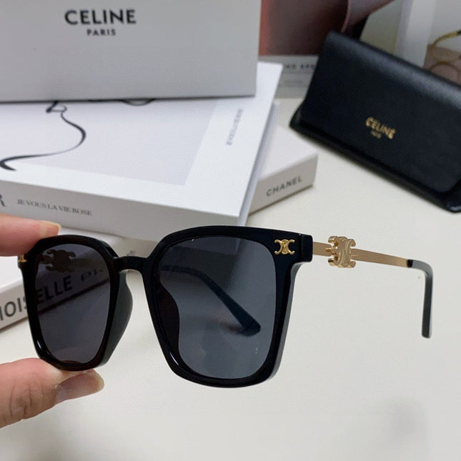 TRIOMPHE SUNGLASS 497820 IN GOLD METAL BLACK LENSES