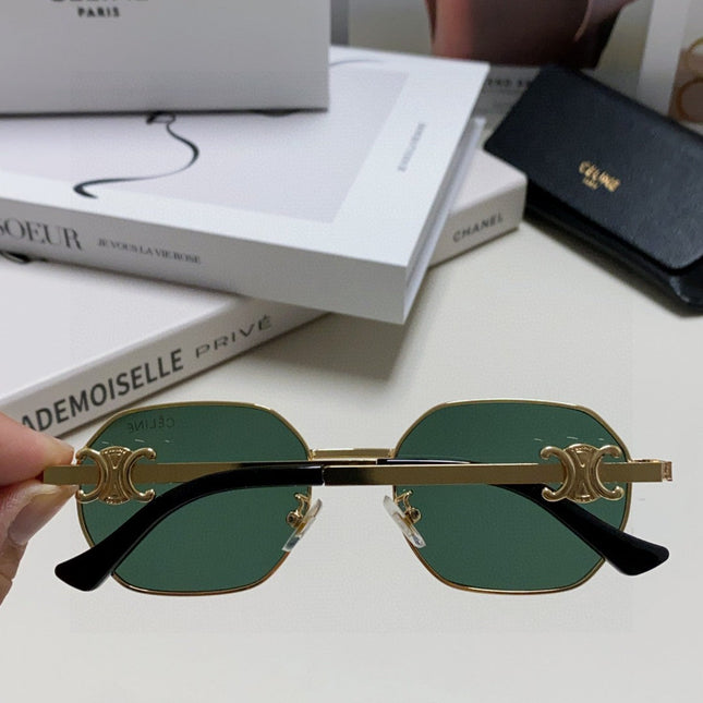 TRIOMPHE SUNGLASS 497821 IN GOLD METAL DARK TEAL LENSES