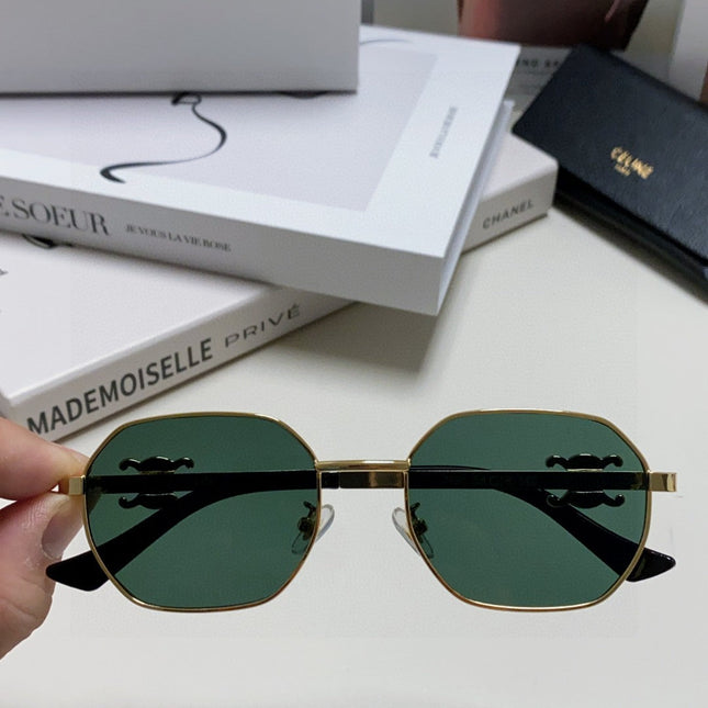 TRIOMPHE SUNGLASS 497821 IN GOLD METAL DARK TEAL LENSES