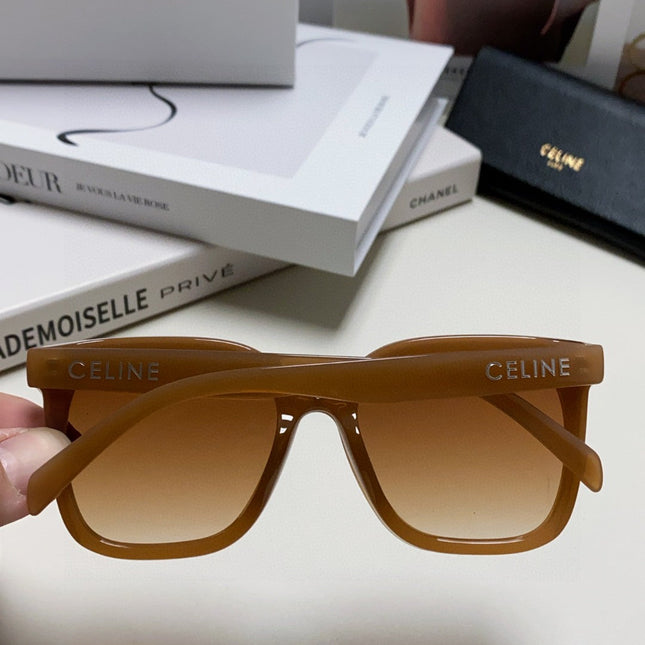 TRIOMPHE SUNGLASSES 552774 IN CARAMEL ACETATE TEXT LOGO