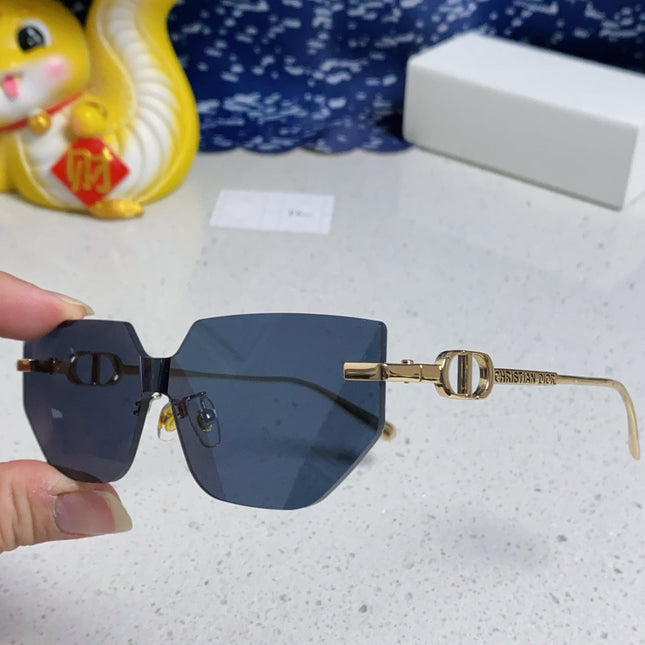 MONTAIGNE SUNGLASS 563194 IN GOLD METAL GREY LENSES