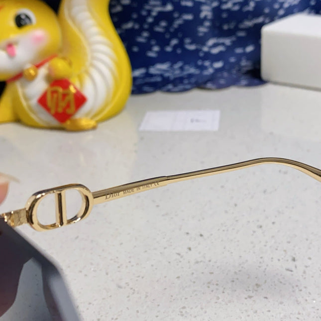 MONTAIGNE SUNGLASS 563194 IN GOLD METAL GREY LENSES