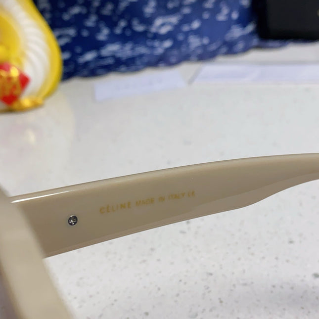 TRIOMPHE SQUARE SUNGLASS 566741 IN IVORY ACETATE