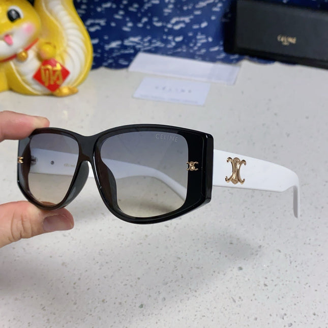 TRIOMPHE SUNGLASS 566216 IN BLACK AND WHITE ACETATE